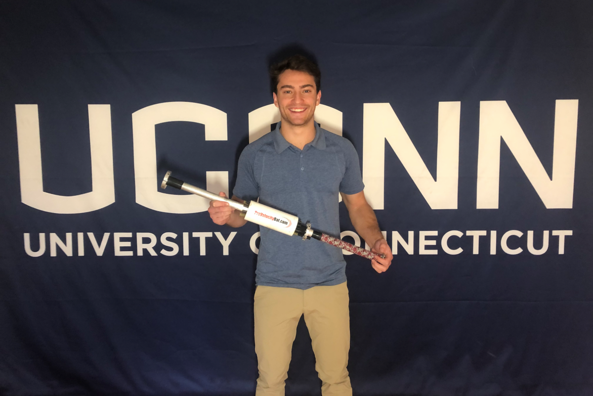 Elijah Taitel, '22 poses with the ProVelocity Bat