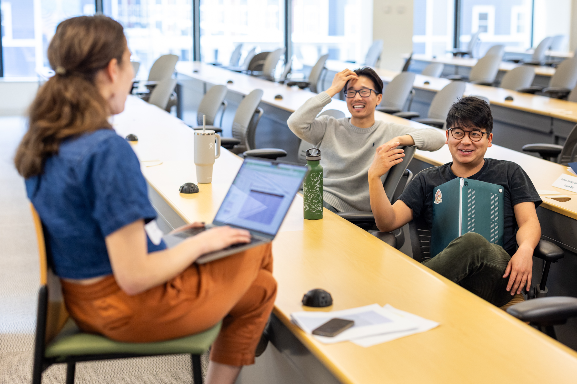 two participants one on one with a mentor